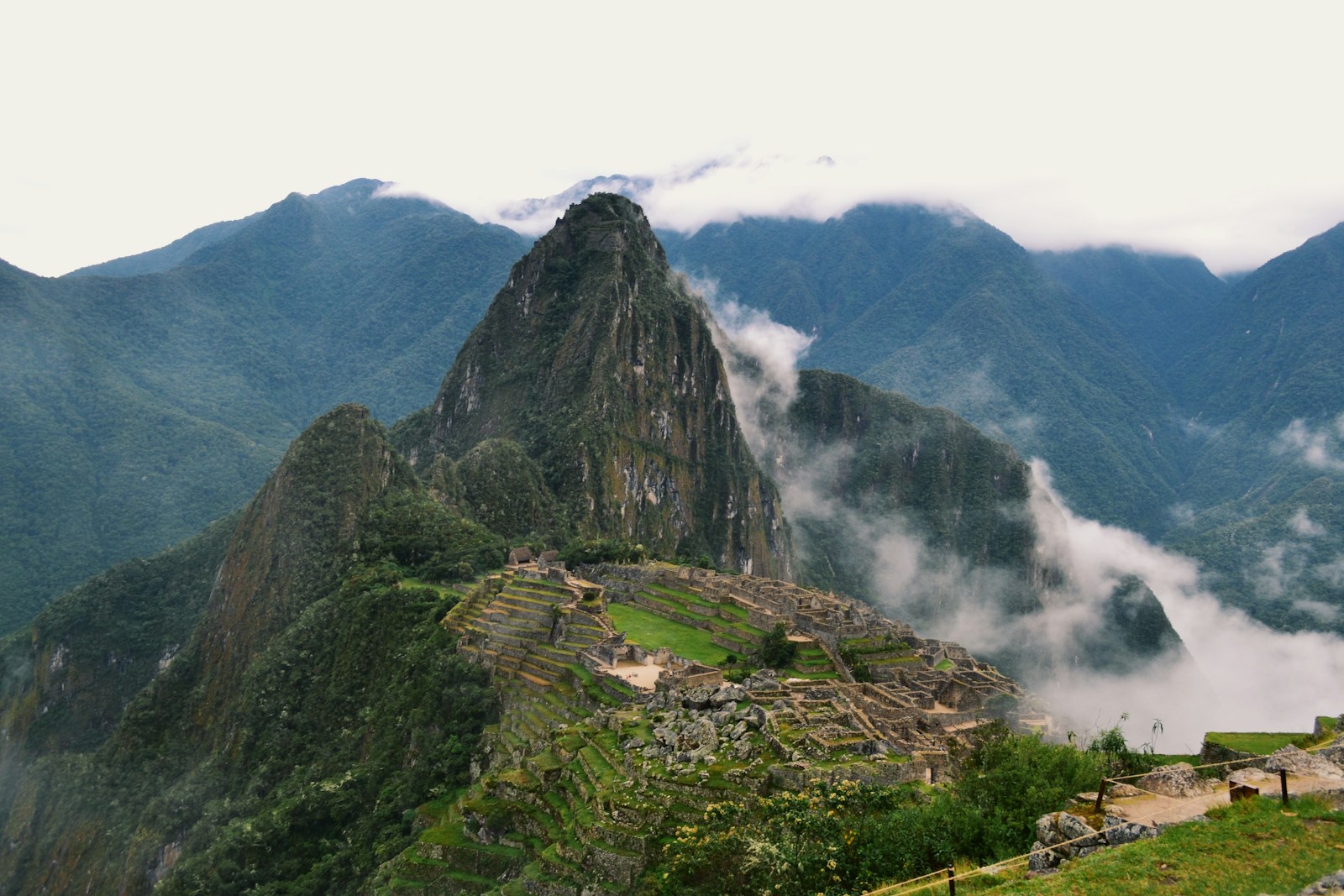green mountain under white clouds during daytime